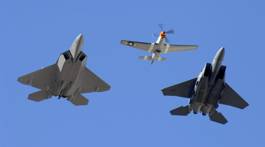 F-22 Raptor and F-15E Strike Eagle formation flight USAF