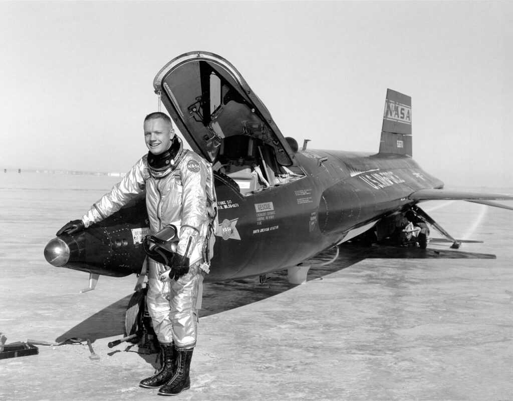 Pilot Neil Armstrong standing next to the NASA X-15 hypersonic research aircraft